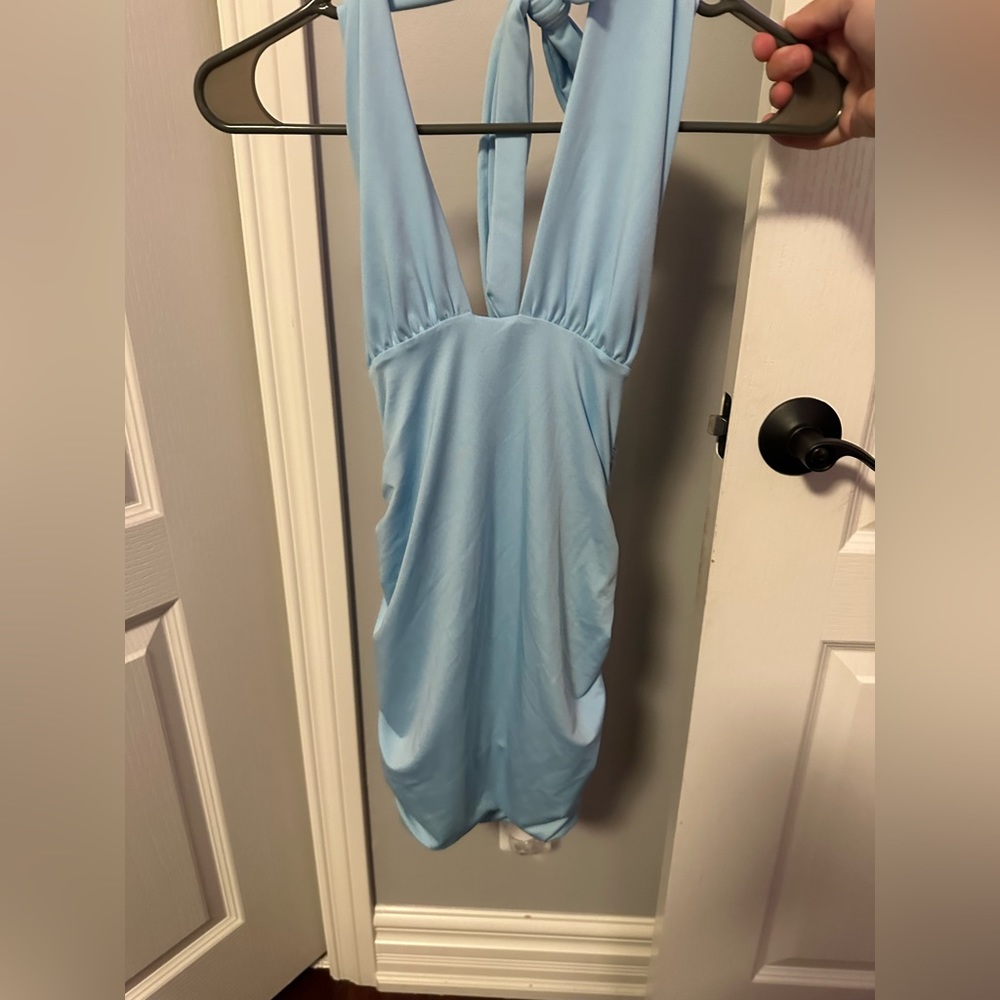 Tight midi dress. Blue super cute for a dinner or club.